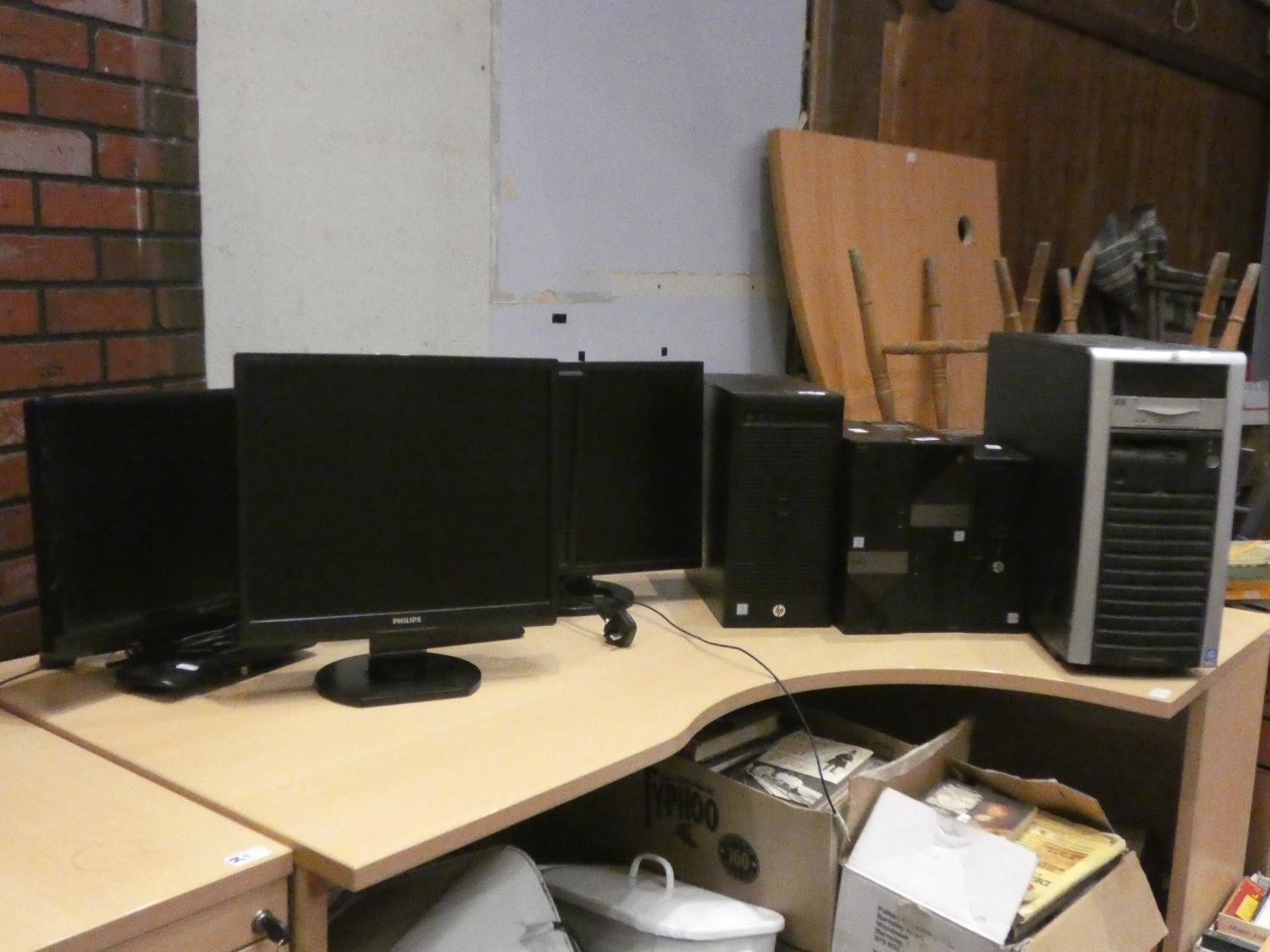 A collection of computing equipment to include- Dell, Hanns-G, Packard Bell and Phillips monitors,