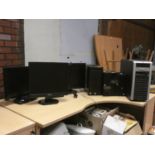 A collection of computing equipment to include- Dell, Hanns-G, Packard Bell and Phillips monitors,