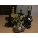 To be sold on behalf of Monkey World, A collection of 12 onyx eggs, various cast iron egg holders