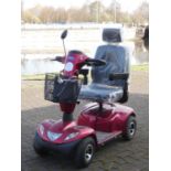 An Invacare Orion four wheeler mobility scooter complete with, battery charger