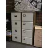 A metal office four drawer filing cabinet, together with a three drawer metal filing cabinet (