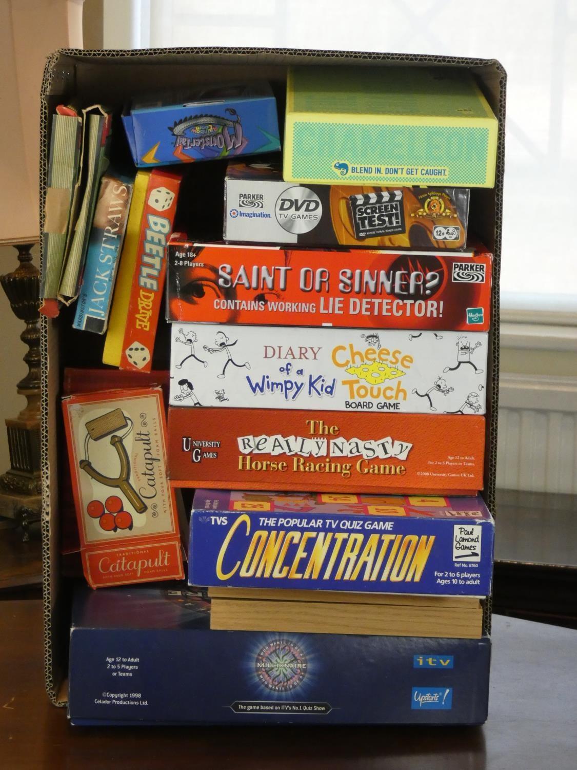 Four boxes of miscellaneous toys and board games, including- Who Wants to be a Millionaire, Saint or - Image 2 of 4