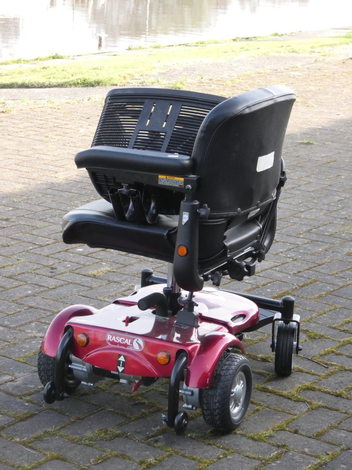 A Rascal battery operated mobility chair, complete with battery charger - Image 3 of 6