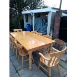 A quality pine farmhouse kitchen table with thick plain top over 2 frieze drawer and turned legs,