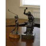 A cast metal figure on a marble base depicting a blacksmith (32cm tall) together with a bronzed