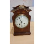 An Edwardian mahogany and boxwood inlaid mantle clock and other mantle and carriage clocks (2)