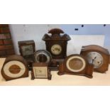 An American stained beech mantle clock and other mantle clocks