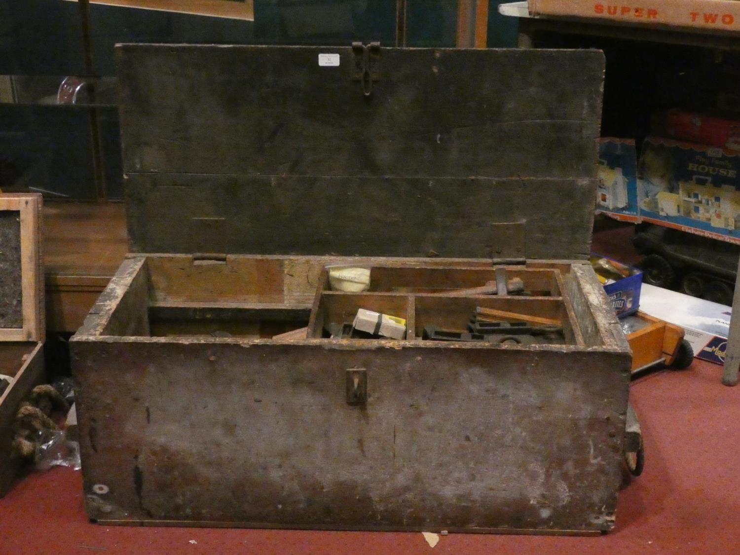 A pine cabinet makers tool chest and contents to include- wood planes, set squares, chisels, saws