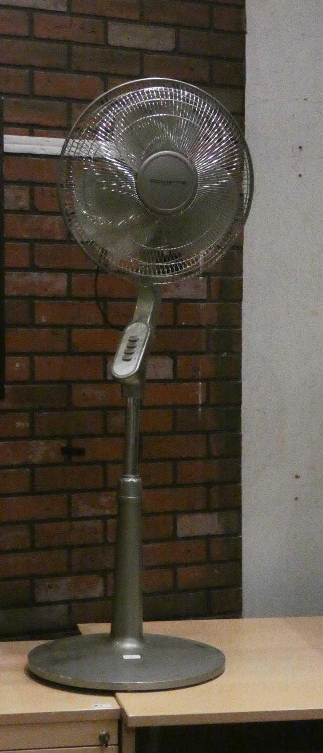 A Rowenta freestanding, oscillating adjustable fan