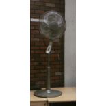 A Rowenta freestanding, oscillating adjustable fan