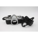 Canon AE-1 35mm SLR Film Camera Body Only, No. 2729899 The camera is WORKING and in a vintage