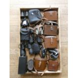 A collection of cased and uncased pairs of Binoculars to include Delacroix, Tasco and Lieberman