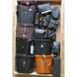 A collection of cased and uncased Binoculars, makers to include Revue and others