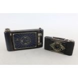 Kodak Vest Pocket Girl Guides Edition (c. 1921-1935) Ensign Midget (c. 1934-1941) Sold for