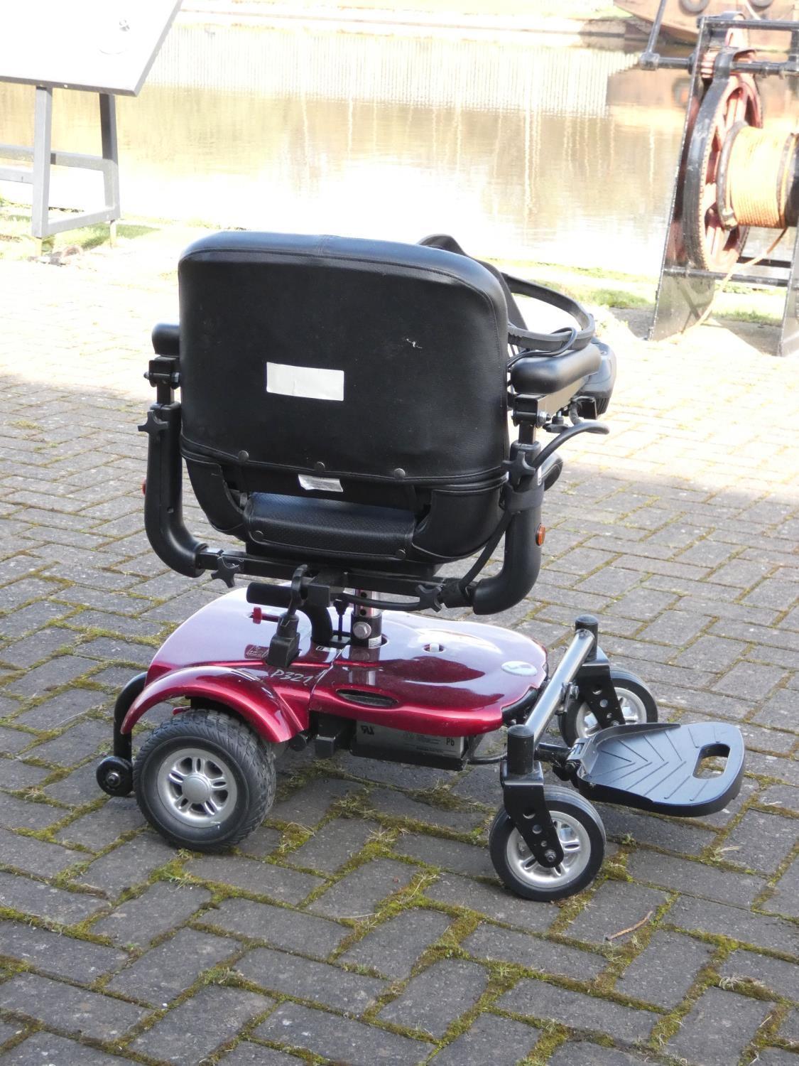 A Rascal battery operated mobility chair, complete with battery charger - Image 4 of 6