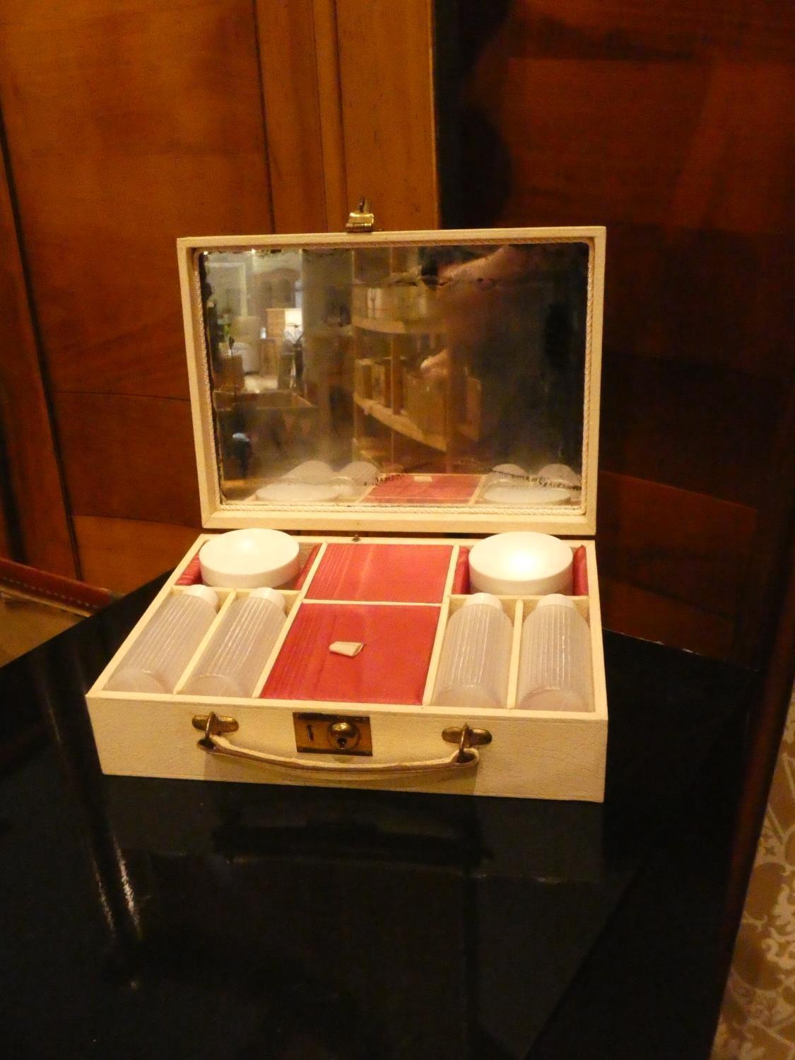 A Lincoln Bennett & Co gentleman's top hat together with a boxed vintage Boots Pharmacy first aid