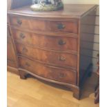 A mahogany serpentine front chest of 4 long drawers, 79 x 50 x 85 cm