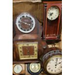 An Edwardian oak case 8 day bulkhead clock, a Smith brass electric lantern clock and other clocks (