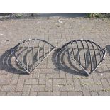 A pair of corner cast iron wall mounted hay racks 81cmx88cm