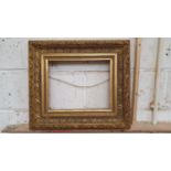 A quantity of gilt frames.