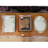 An Art Nouveau style dressing table mirror. 34cm x 24cm together with a cast metal gilt Art Deco