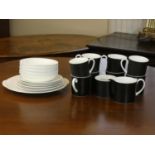 A Susie Cooper Contrast (C2068) including- eight tea cups, seven saucers, six side plates, serving