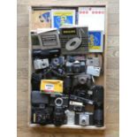 A collection of cameras and video cameras, including Eumig Viennette 5, a Bell and Howell Super 8