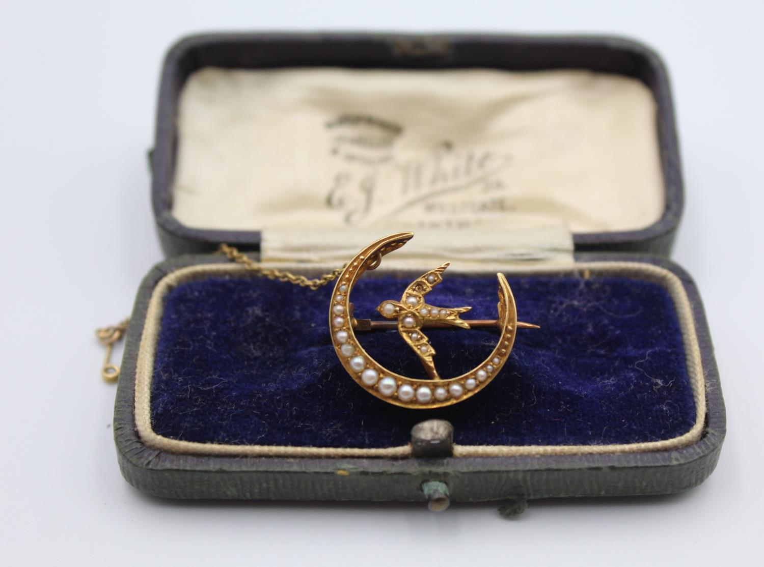 A Victorian 15ct gold and half pearl brooch, Chester hallmark, no date letter, in the form of a