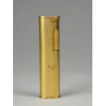 A gold plated Dunhill lighter with reeded decoration, length 72 cm
