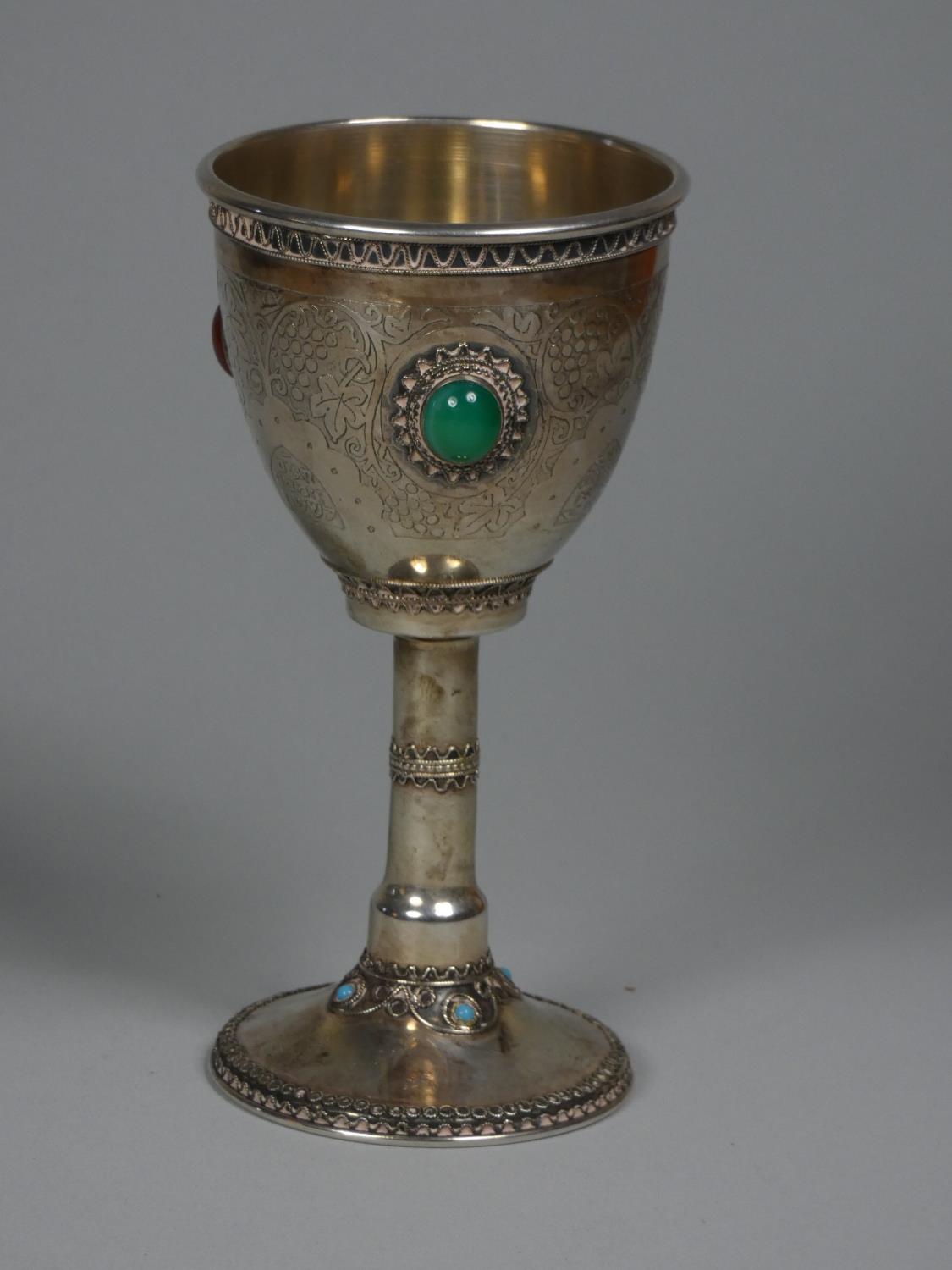 An Israeli silver goblet, by Stanetzky, with applied wirework and semi-precious stones, chased