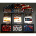 A Vivid by Barcrest slot machine group, Red, White and Blue, with overhead lighting board, in