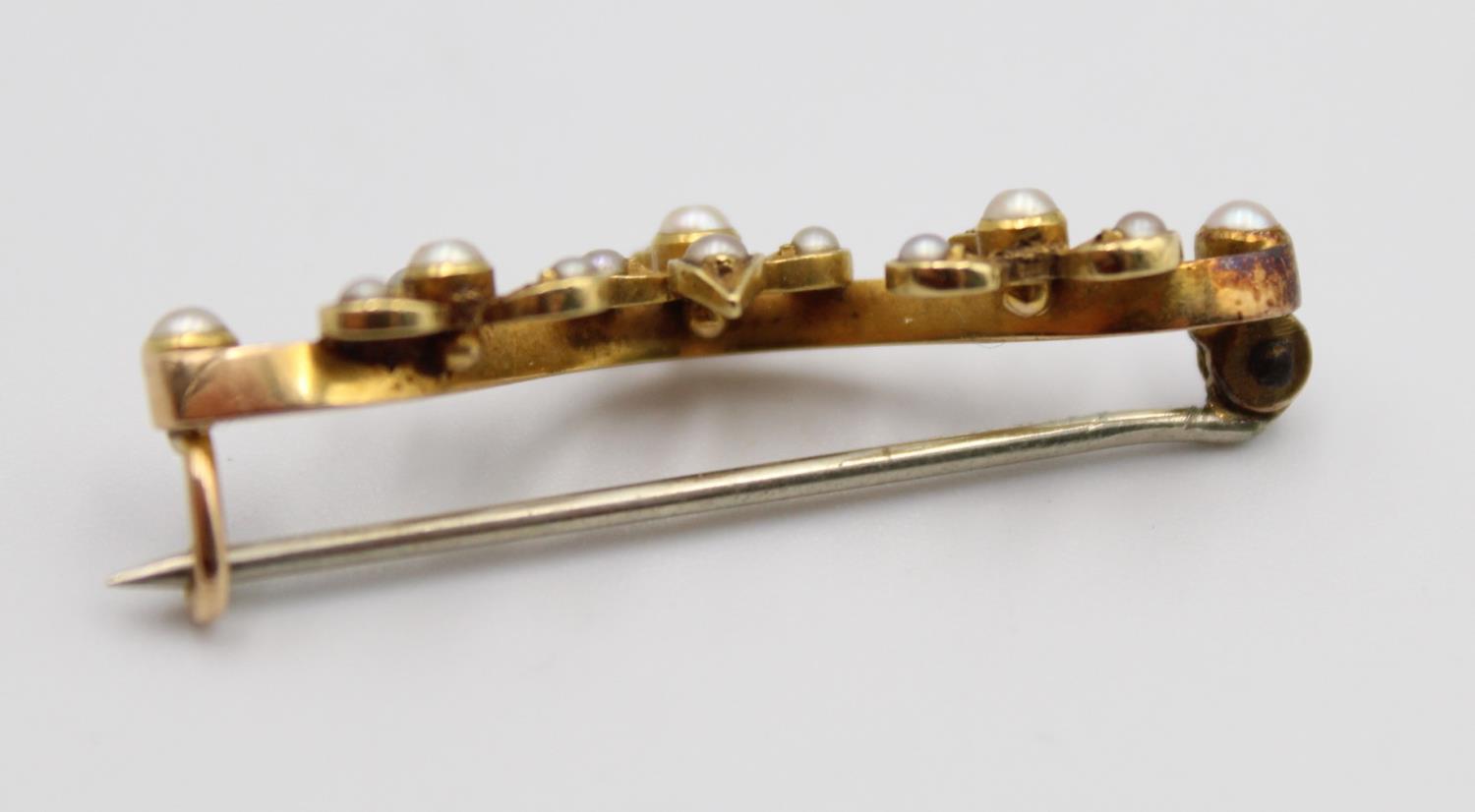 A Victorian gold and half pearl bar brooch, with trefoil designs and a 9ct gold peridot and pearl - Image 11 of 11