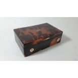 A 19th century French silver and gold mounted tortoiseshell musical box,
