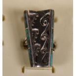 Lennie Parker, a Navaho silver and turquoise ring, c.1980's with geometric decoration, size L.