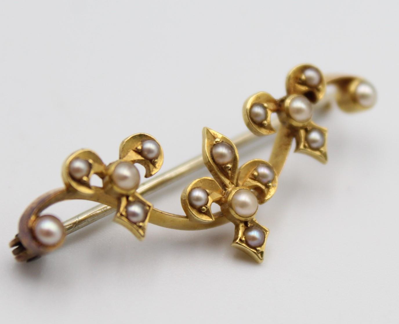 A Victorian gold and half pearl bar brooch, with trefoil designs and a 9ct gold peridot and pearl - Image 3 of 11