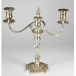 A silver two branch, three light candelabra, by Barker Ellis & Co. Birmingham 1965, of octagonal