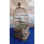 A coin operated singing bird in cage automaton, probably, French, circa 1890, the bird with moving