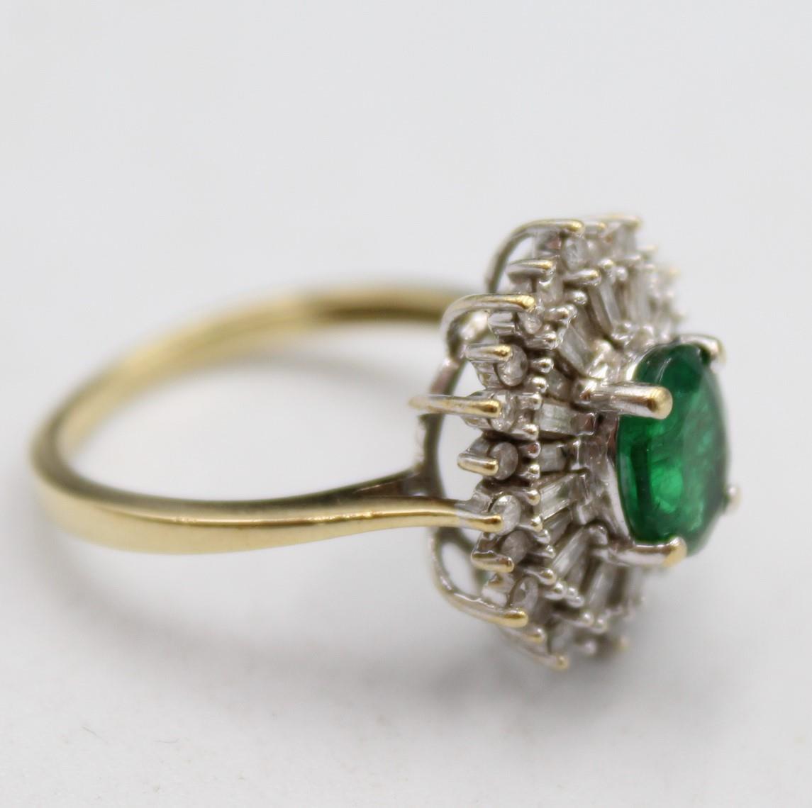 A 9ct gold emerald and diamond cluster ring, the claw set oval stone bordered by baguette and - Image 3 of 5