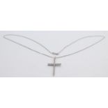 A 9ct white gold diamond cross pendant, claw set with brilliant cut stones, 3 x 2 cm chain, 3gms.