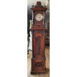 An impressive symphonia longcase mahogany clock, c.1897, the 9" silvered dial with Arabic numerals,