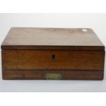 An Edwardian mahogany artists box, by G. Rowney & Co., with drawer beneath, the lid opening to a