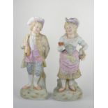 A 19th century Continental pair of cold painted bisque figures, depicting a boy and girl, 36cm,