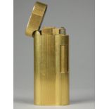 A gold plated Dunhill lighter with reeded decoration, length 65cm
