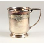 A silver christening mug, Birmingham 1945, with engine turned decoration, 5 oz.