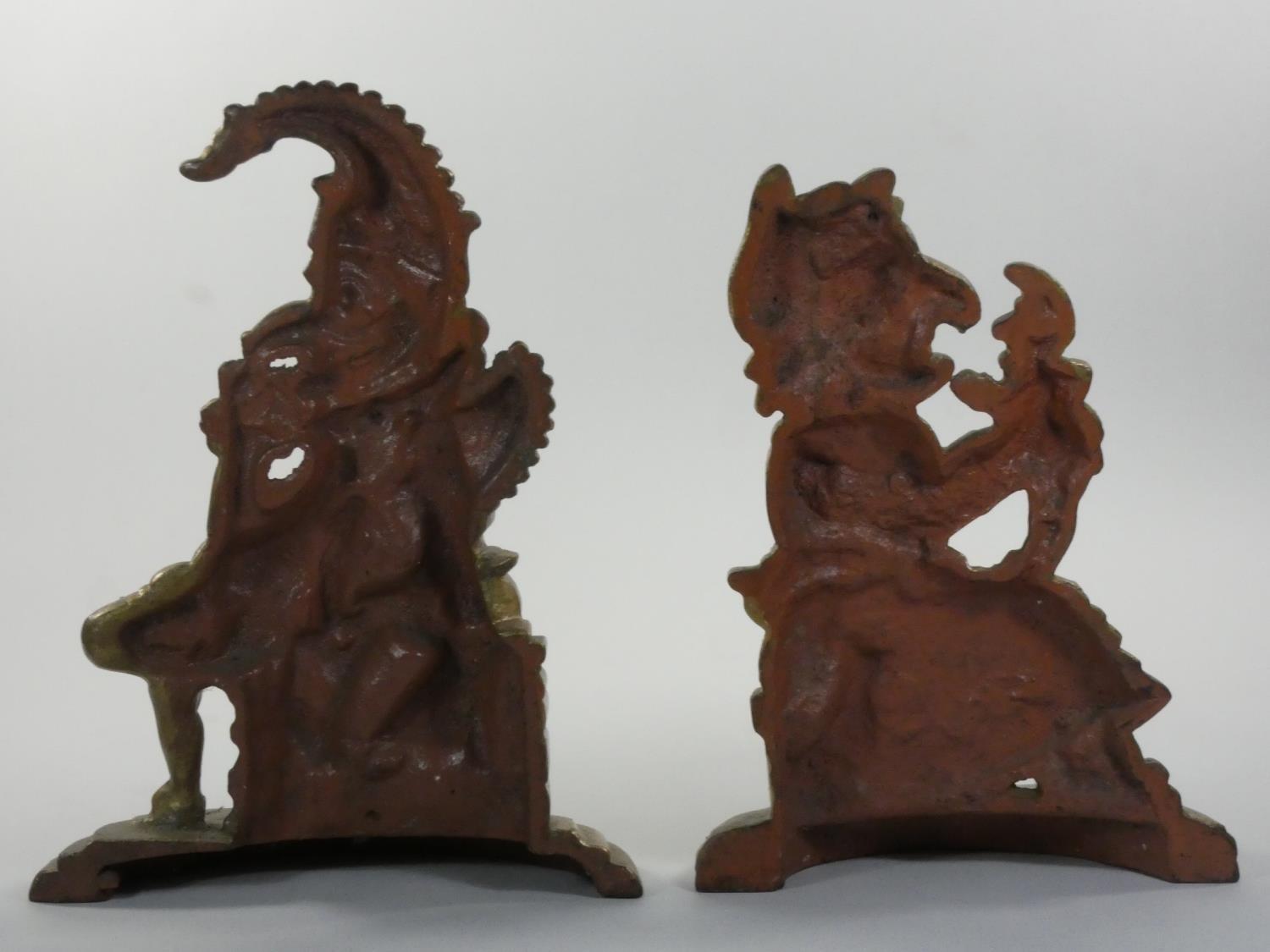 A cast iron pair of door stops, in the form of Punch and Judy, later painted, 32 cm. - Image 2 of 2