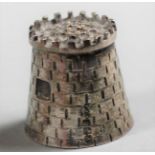 A novelty silver cast thimble, Dublin 1993, in the form of a castle, as et of six rat tail coffee