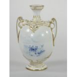 A Royal Worcester two handled urn, decorated with fishermen and a bay scene, gilt border, pattern