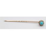 A Victorian turquoise and diamond stickpin, the screw off top set with old cut stones, diameter 9mm.