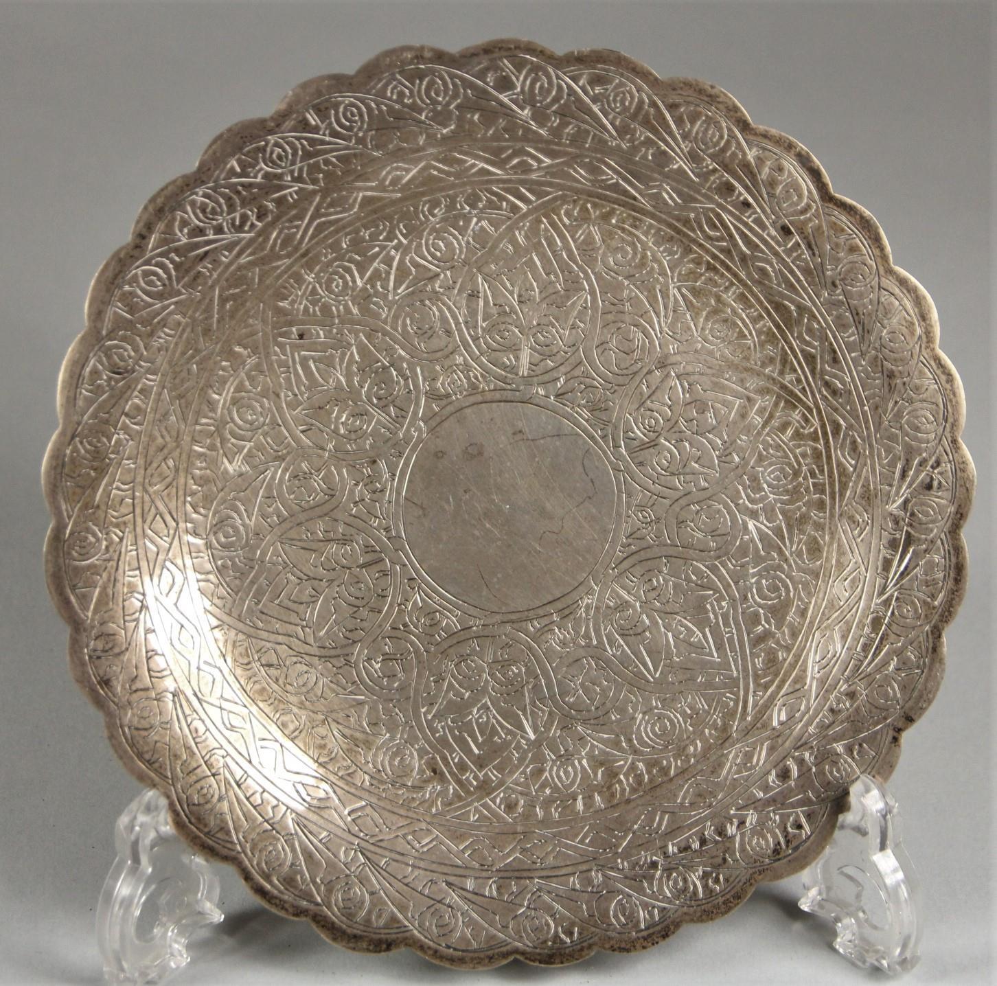 An Egyptian silver shallow dish, bearing 900 standard silver and post 1946 control marks, with