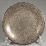 An Egyptian silver shallow dish, bearing 900 standard silver and post 1946 control marks, with